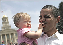 Obama Smirks at Child